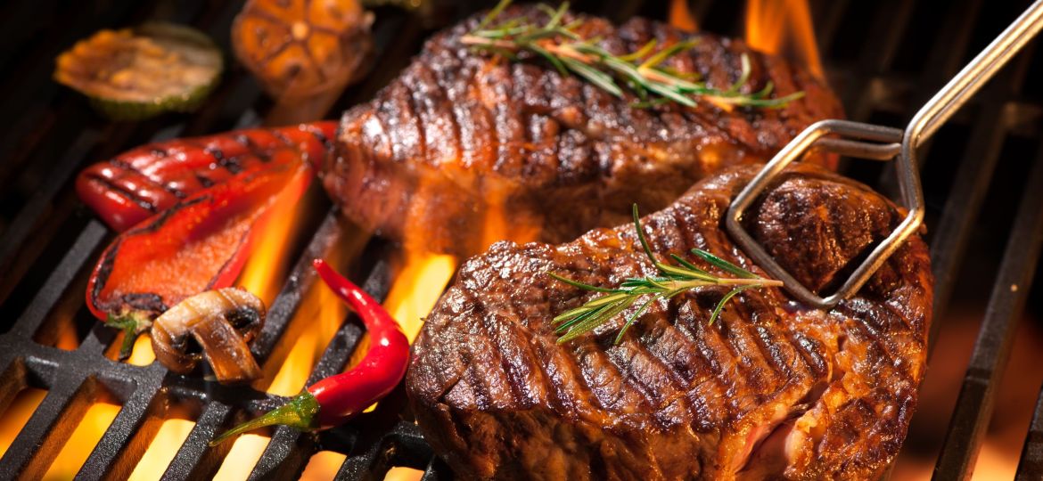 Beef steaks on the grill